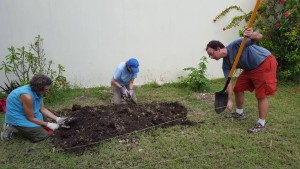 Rev. Chris and Amanda working on the garden at FSIL.