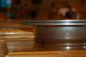 Closeup of an offering plate. Closeup of an offering plate.